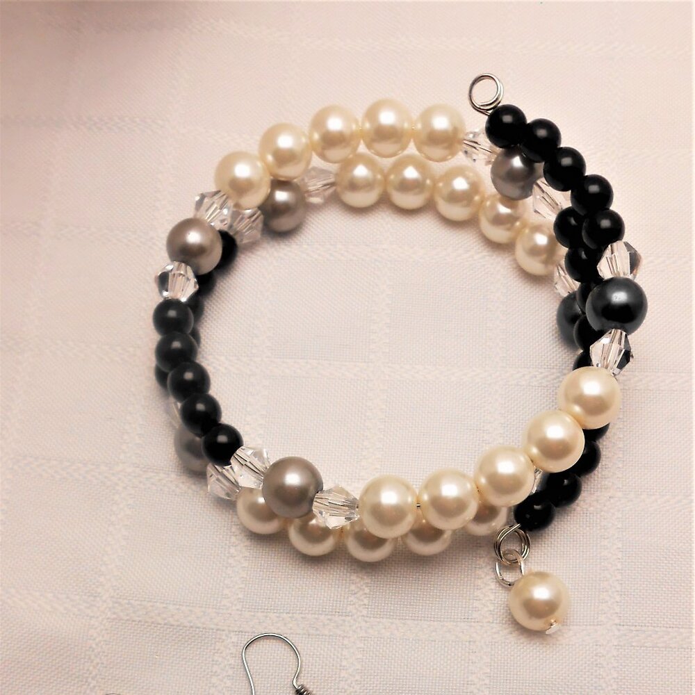 Handmade jewelry set with memory wire bracelets and asymetrical earrings